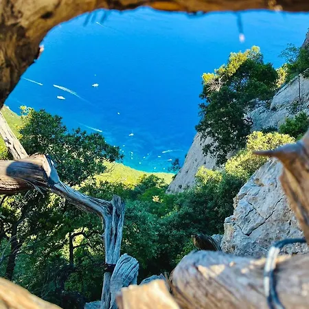 Апартаменты Cala Liberotto-Casa Relax Con Veranda Кала-Либеротто